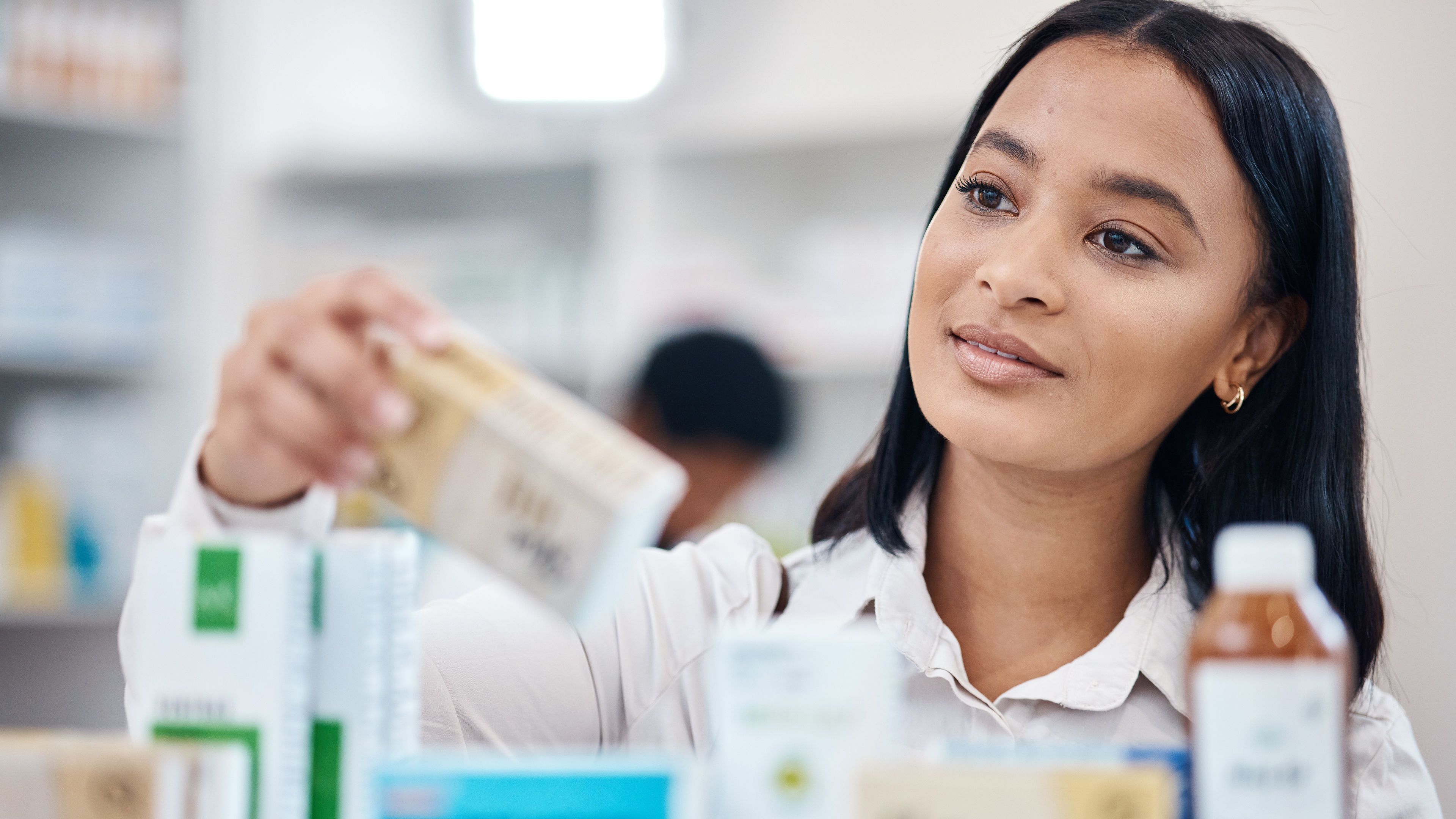 pharmacy and woman with pills