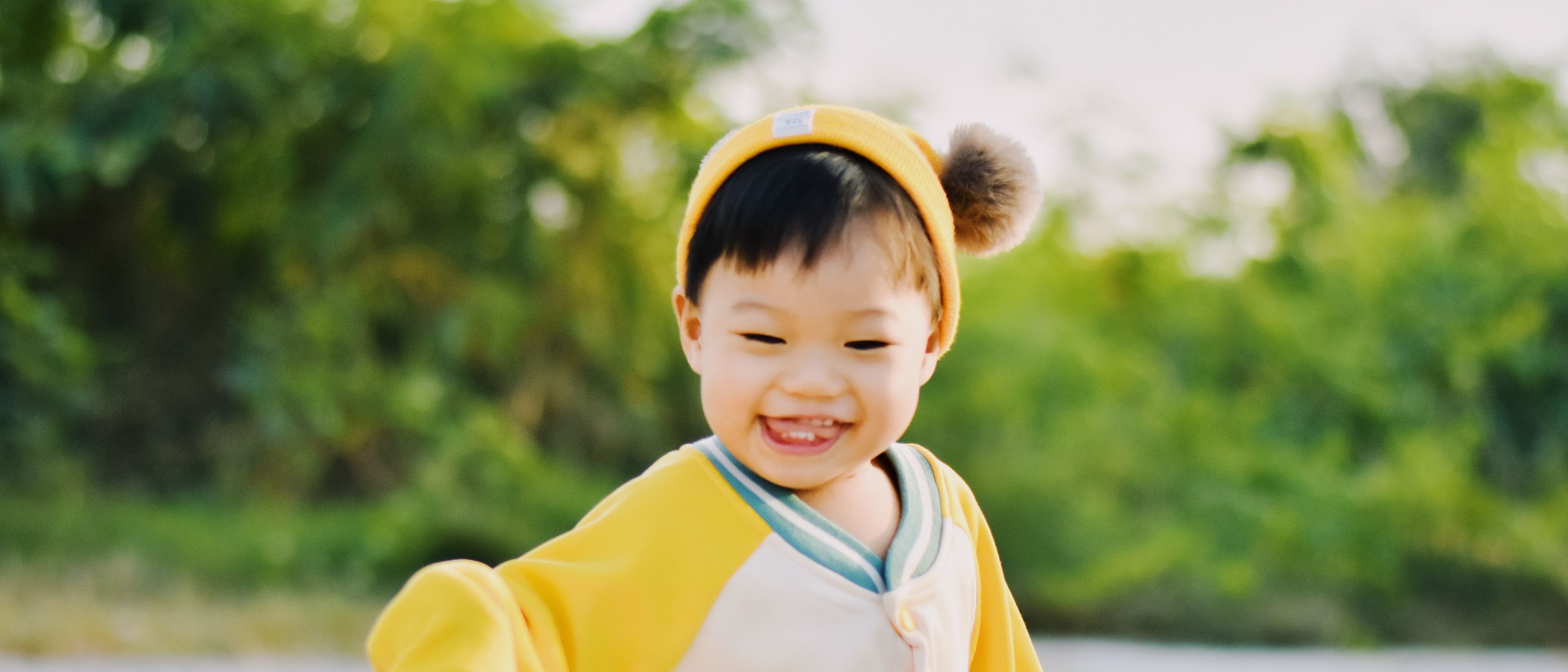 Cute baby playing in park.