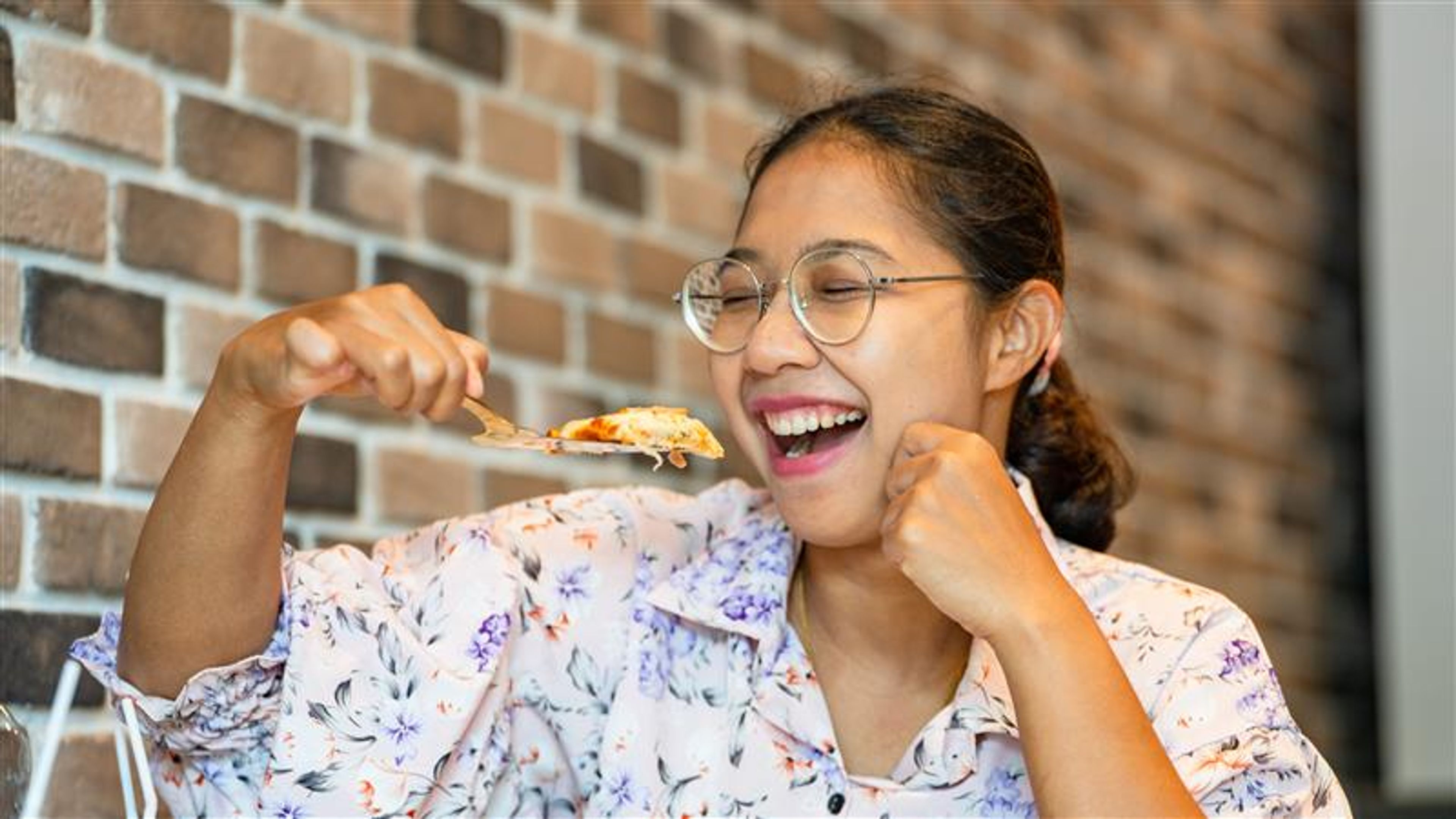 A woman enjoying food